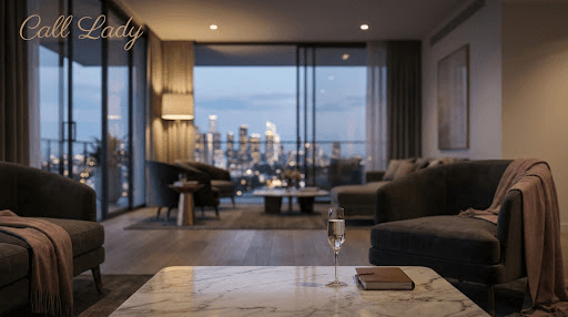 Luxury penthouse overlooking city skyline at night